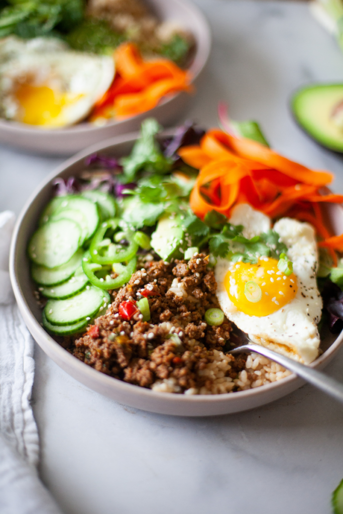 Korean beef bowl on a white tabletop.