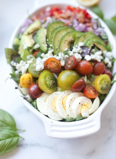 Learn how to make restaurant quality salads at home that are also macro-friendly! My 5 simple tips will take your salads to the next level. www.lillieeatsandtells.com