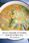 A pot of vegetable soup with carrots, peas, and herbs. Text overlay reads: 5 Healthy and Macro-friendly Soups for Fall. lilliecatsandtells.com.