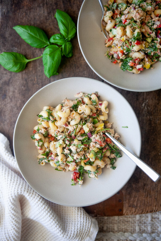 Tuna pasta salad in a large white bowl.