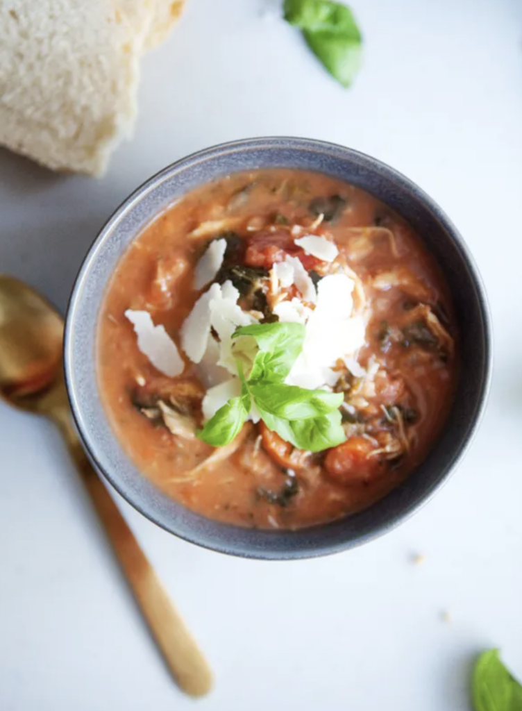 Bowl of Instant Pot Creamy Tomato Chicken Soup. One of my 5 Healthy and Macro-friendly Soups for Fall.