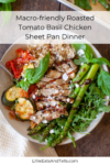A bowl with sliced Roasted Tomato Basil Chicken, brown rice, asparagus, zucchini, tomatoes, fresh basil, and balsamic glaze, set on a textured placemat. Text overlay reads: Macro-friendly Roasted Tomato Basil Chicken Sheet Pan Dinner.