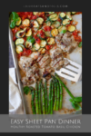 A sheet pan with grilled chicken, roasted asparagus, sliced zucchini, and a savory roasted tomato-basil sauce, garnished with fresh basil. A metal spatula rests under some chicken. Roasted Tomato Basil Chicken Easy Sheet Pan Dinner is written below.