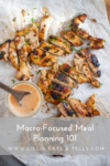 Grilled chicken breast slices on parchment paper, garnished with herbs. A bowl of creamy sauce with a spoon sits nearby—perfect for your Macro-Focused Meal Planning journey. Text overlay reads: Macro-Focused Meal Planning 101 - www.lillieeatsandtells.com.