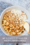 A bowl with chopped apples, granola, nuts, cinnamon, and yogurt. Text overlay reads: My 5 Macro-Friendly Costco Favorites for Meals www.lillieeatsandtells.com.