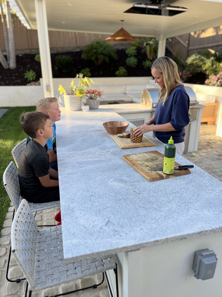 Why I love my outdoor kitchen (me cooking with my sons)
