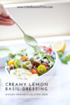 A hand drizzles creamy Lemon-Basil Dressing over a fresh salad with colorful tomatoes and greens. Text reads: Creamy Lemon-Basil Dressing—Macro-Friendly, Gluten-Free.