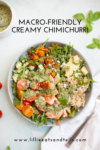 A vibrant salad bowl featuring shrimp, tomatoes, cucumber, corn, greens, and a generous drizzle of creamy chimichurri sauce. Text reads Macro-Friendly Creamy Chimichurri and www.lillieeatsandtells.com.