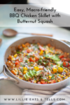 A skillet filled with BBQ chicken, butternut squash, cherry tomatoes, corn, onions, and herbs sits on a table. Text above describes the recipe as an Easy BBQ Chicken and Butternut Macro-Friendly Skillet that’s perfect for a balanced meal.