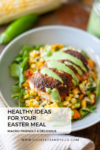 A bowl with blackened salmon over corn salad and greens, drizzled with green sauce. Text overlay: Macro-Friendly Favorites for Easter—Healthy Ideas for Your Easter Meal that are both delicious and nutritious. Website: www.lillieeatsandtells.com.