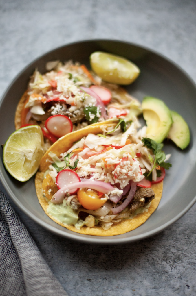 Tacos topped with Avocado-Cilantro Cream