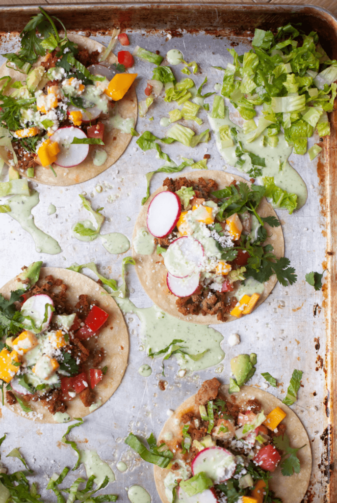 Fully decked out turkey tacos on a sheet pan lillieeatsandtells.com