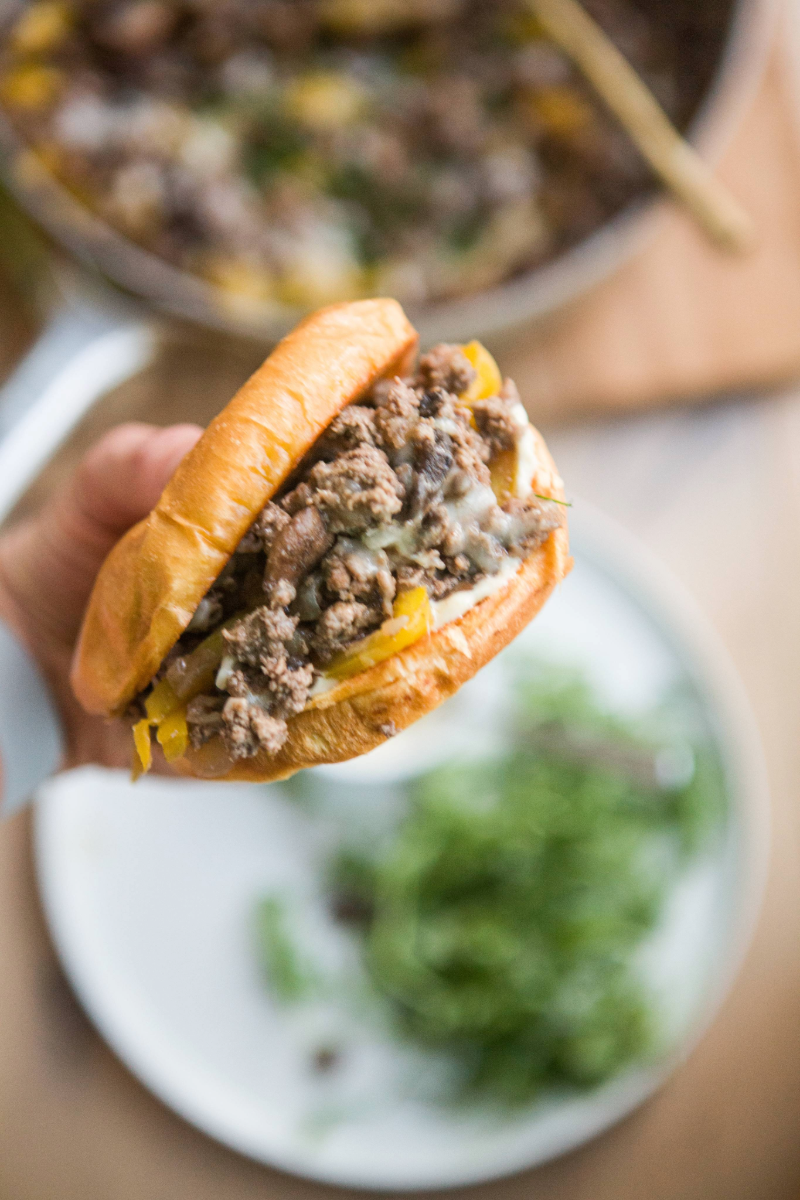 Ground beef philly skillet with mustard aioli on the bun.