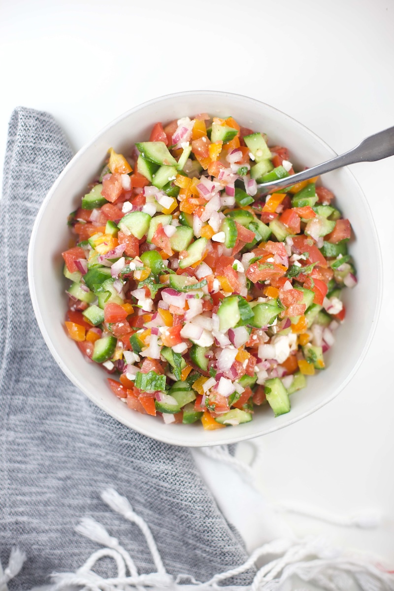 Greek cucumber salsa in a large white bowl.