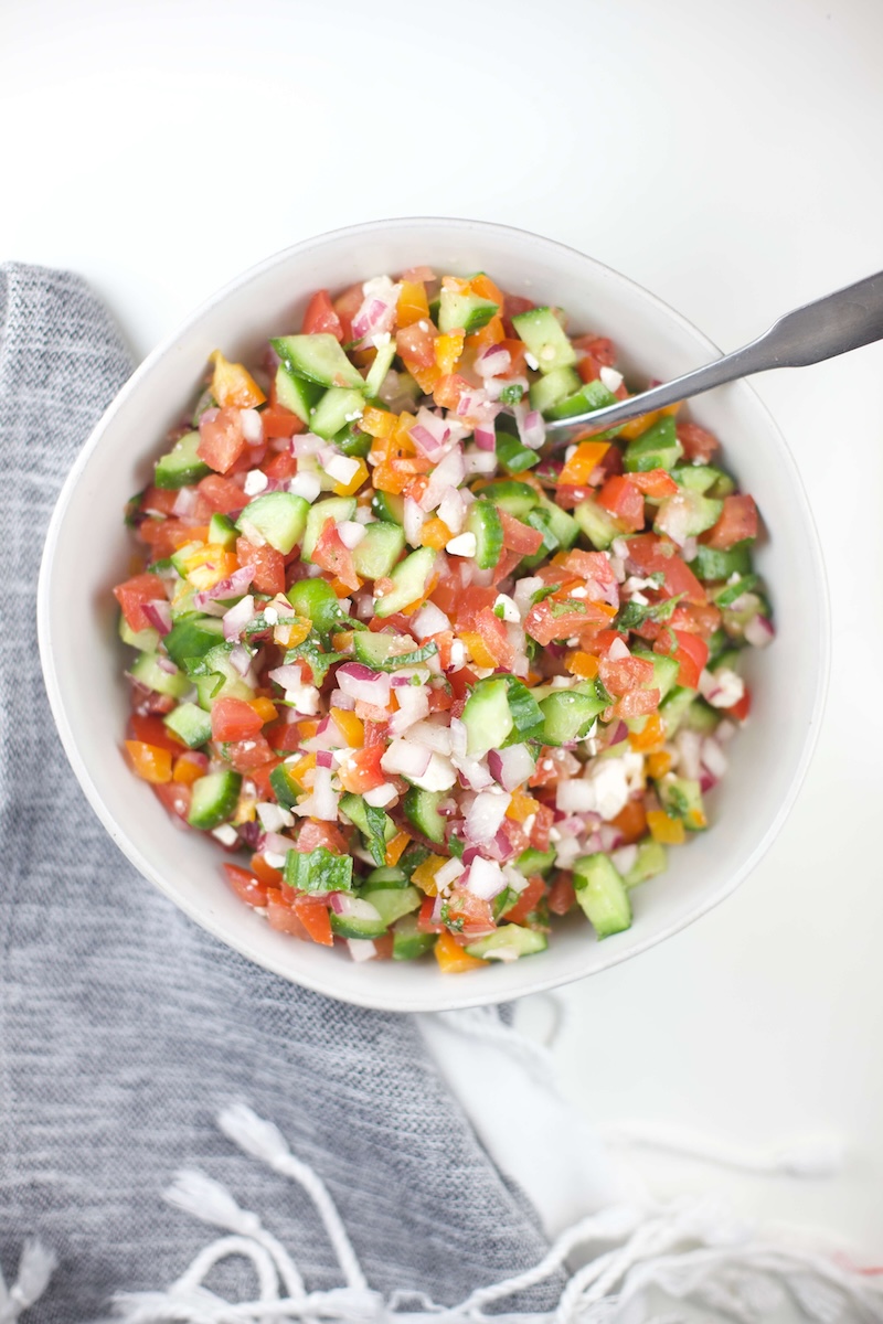 Ingredients for Greek cucumber salsa in a serving dish.