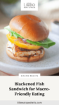 Fish sandwich on a brioche bun on a white plate