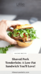 Pork tenderloin sandwich with arugula and tomatoes.