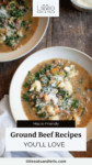 Two white bowls filled with beef and kale soup.