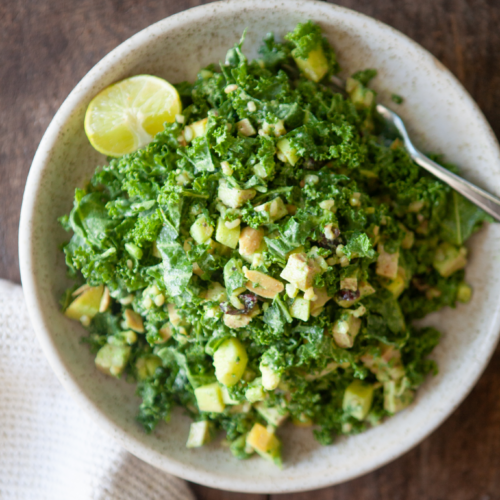 Wild Rice and Kale Salad in a large bowl with a white napkin.