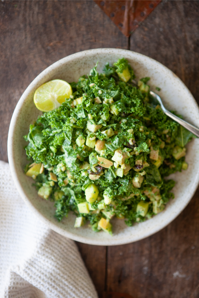 Wild Rice and Kale Salad in a large bowl with a white napkin.