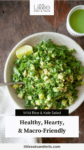 Bowl of salad with a spoon with text overlay, "Healthy, Hearty, & Macro-Friendly."