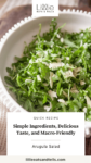 Close up of simple arugula salad in a white bowl with text overlay, "Simple Ingredients, Delicious Taste, and Macro-Friendly."