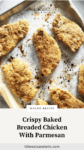 Baked breaded chicken on sheet pan with text overlay "Crispy Baked Breaded Chicken with Parmesan."