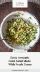 Bowl of avocado corn salad with text overlay, "Zesty Avocado Corn Salad Made With Fresh Limes."