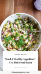 White bowl with pineapple radish salsa with text overlay, "Need A Healthy Appetizer_ Try This Fresh Salsa."