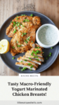 Plate of sliced chicken with text overlay, "Tasty Macro-Friendly Yogurt Marinated Chicken Breasts!"