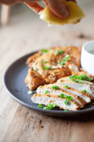 Close up of sliced yogurt marinated air fryer chicken.