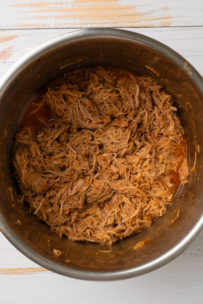 Red enchilada pork shredded in instant pot.
