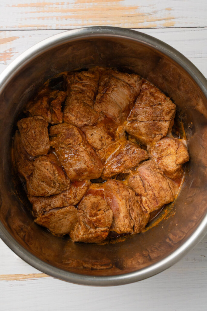 Cooked pork tenderloin in instant pot for enchilada pork.