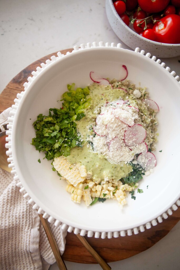 Ingredients for mexican kale salad in white bowl.