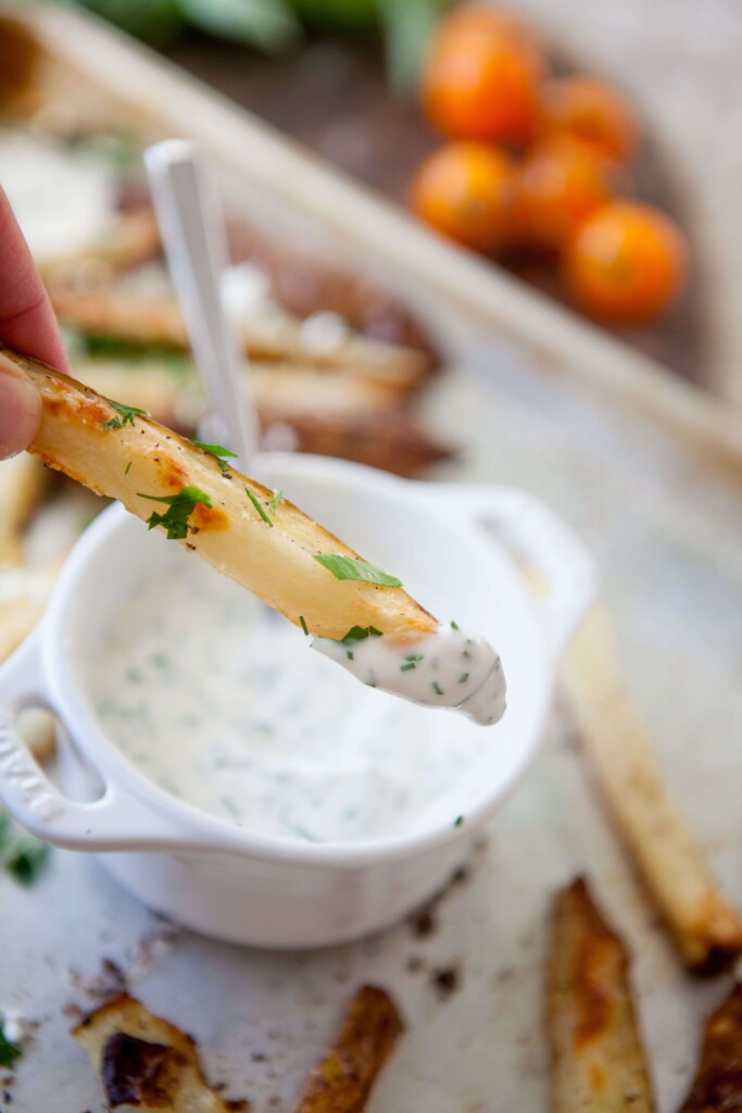 Feta parsley potato wedge dipped into buttermilk chive dip.