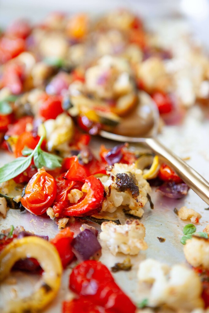 Basil roasted veggies on large sheet pan.