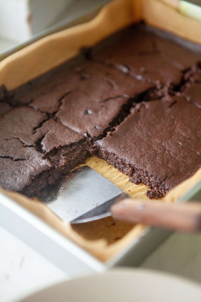 Chocolate protein breakfast bars cut in a 9x13 dish.