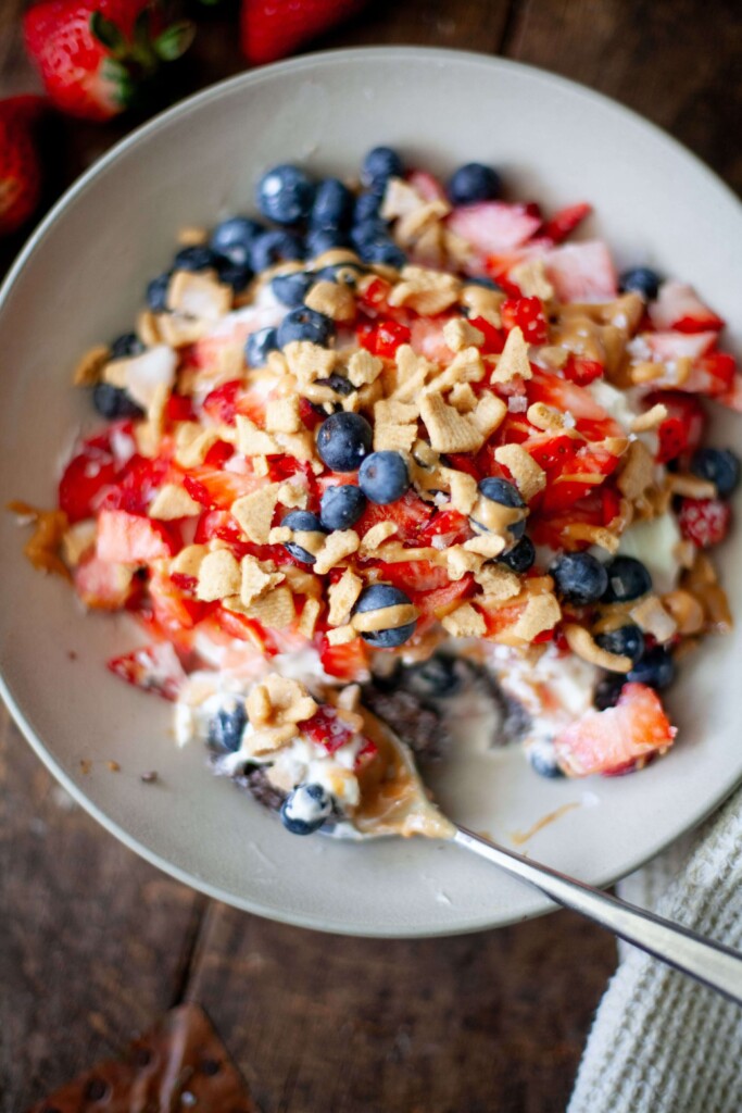 Chocolate breakfast bar served in a bowl with toppings.
