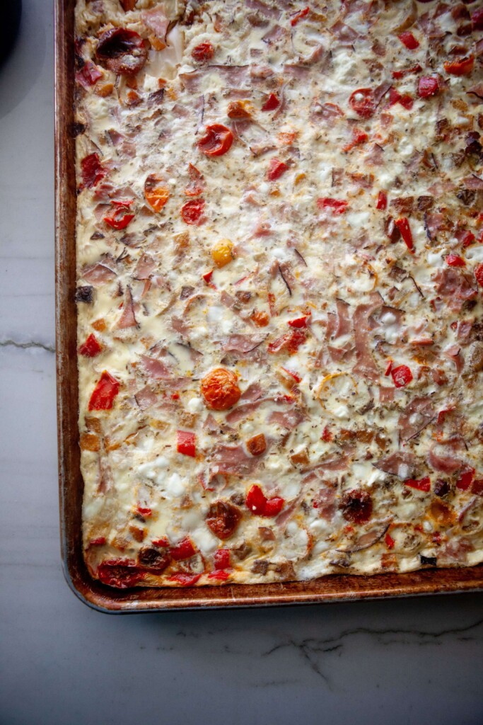 Sheet pan roasted veggie egg bake cooked on sheet pan.